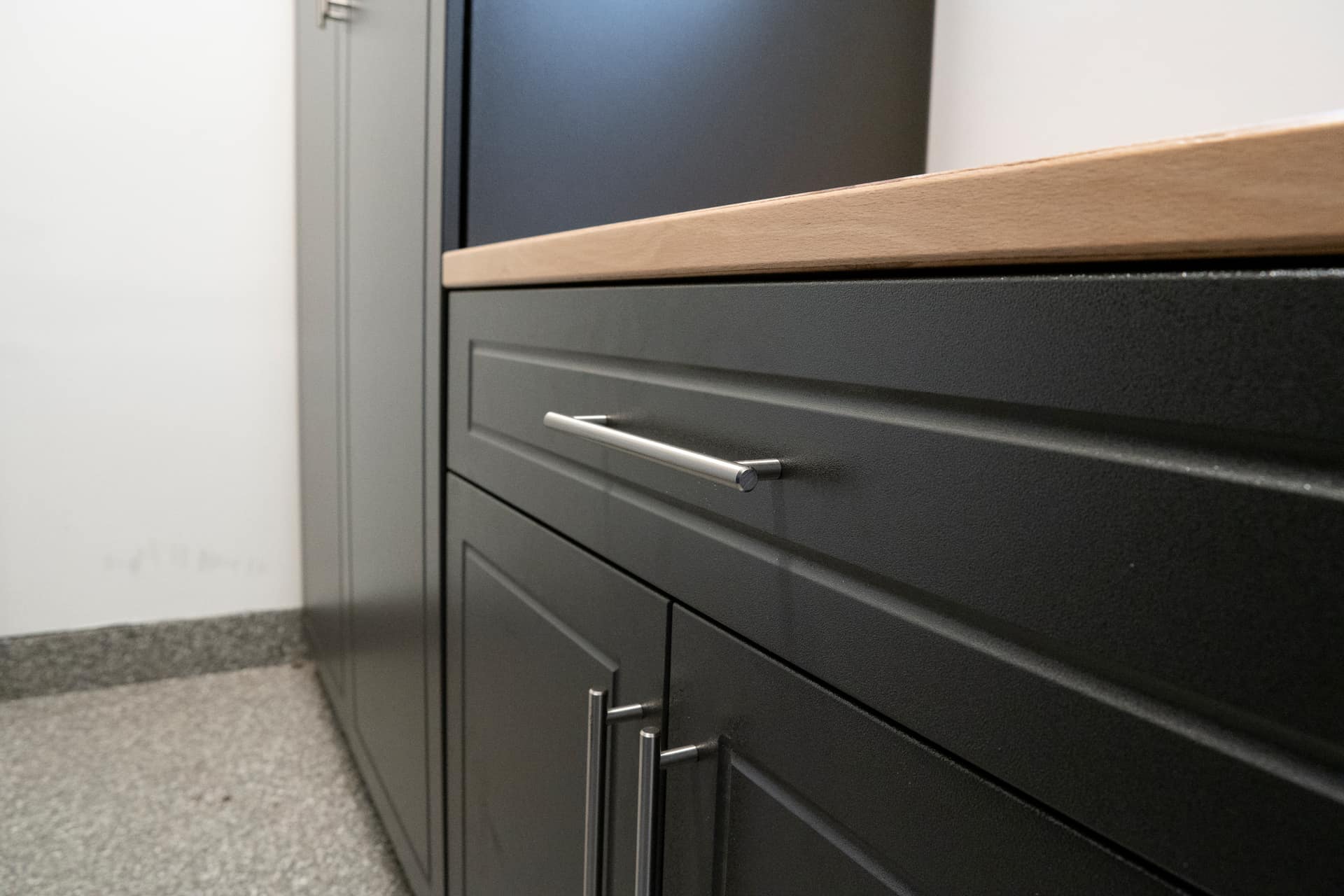 Premium garage cabinets with integrated workbench and powder coated finish for long-term durability